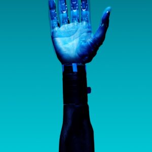 alt="Free Prosthetic Arm on Blue Background Stock Photo"